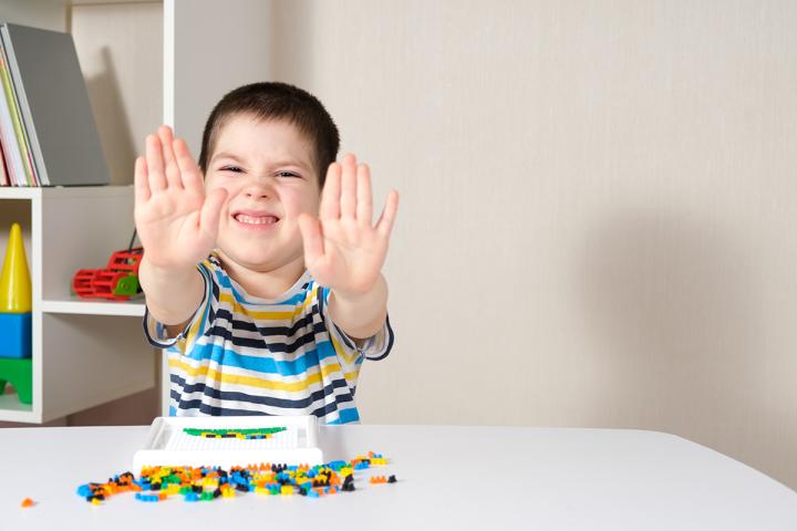 Child playing with legos